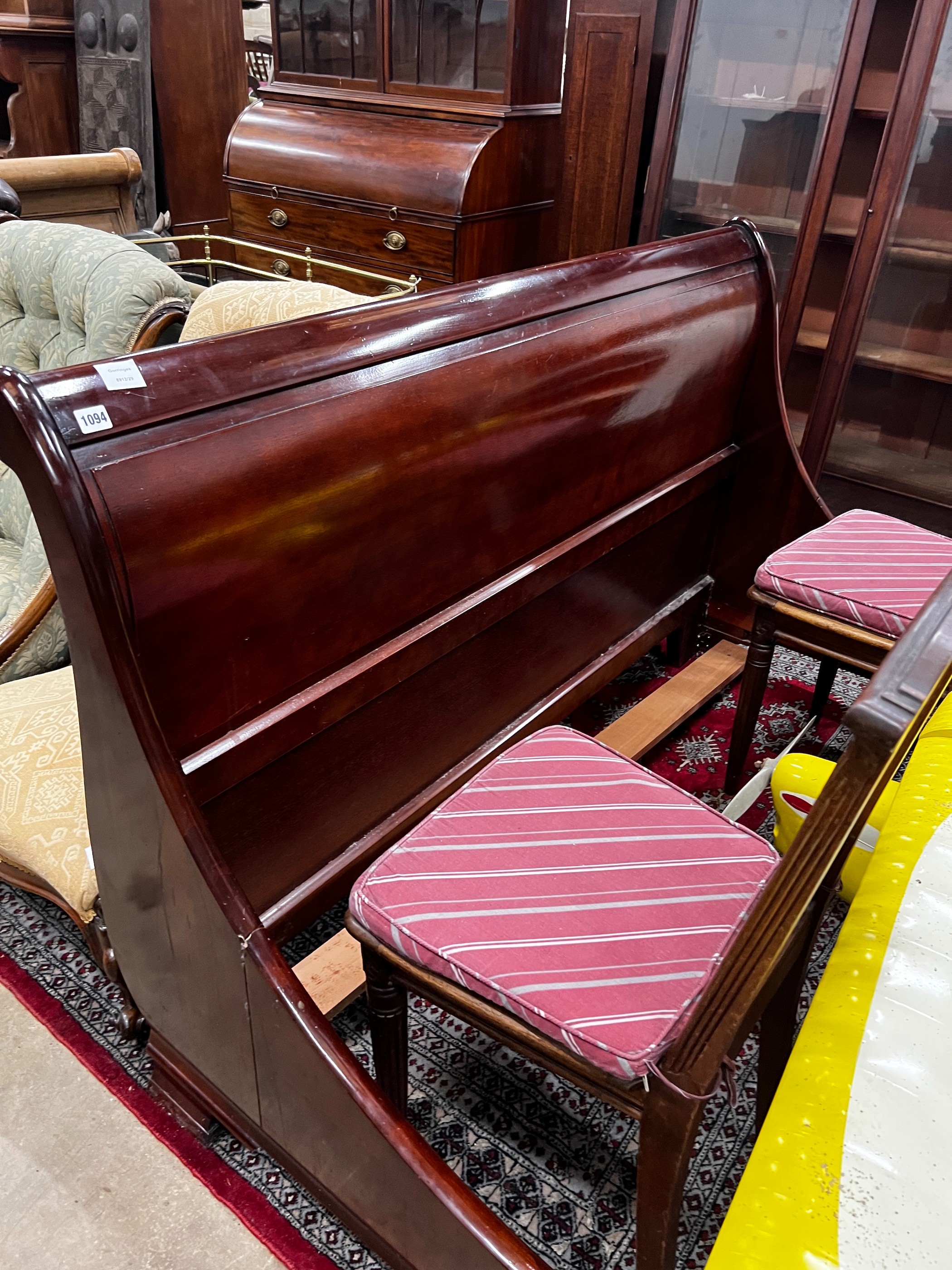 A reproduction mahogany double sleigh bed frame, width 161cm, length 240cm, height 100cm, *Please note the sale commences at 9am.